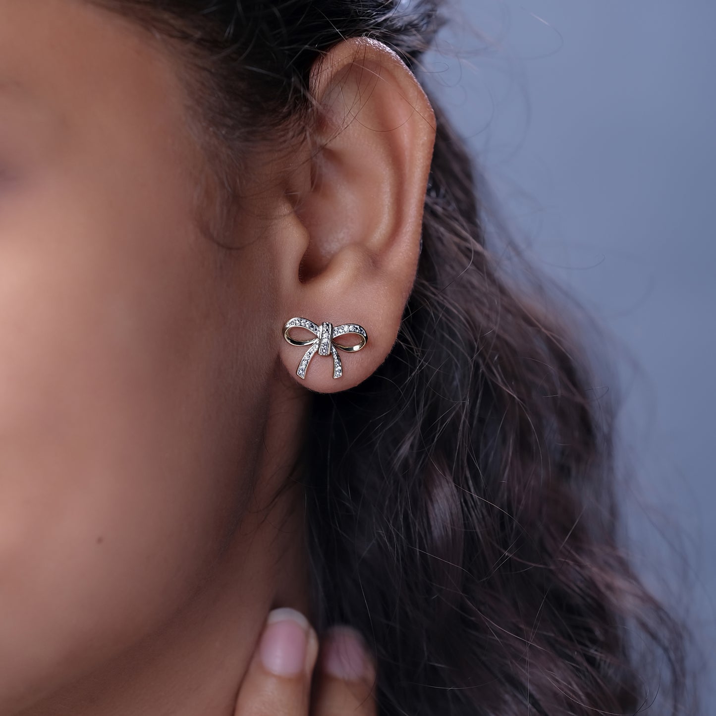 Diamond Accent Ribbon Bow Earrings in 925 Sterling Silver
