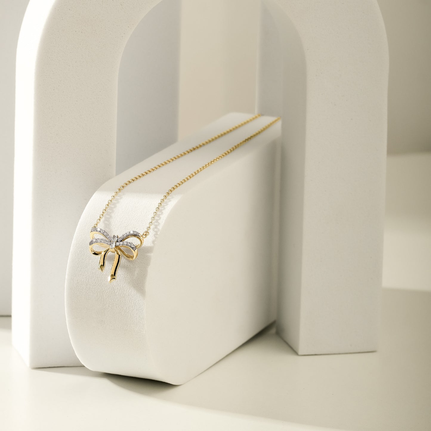 Diamond Bow Necklace in 14K Yellow Vermeil Plated Silver